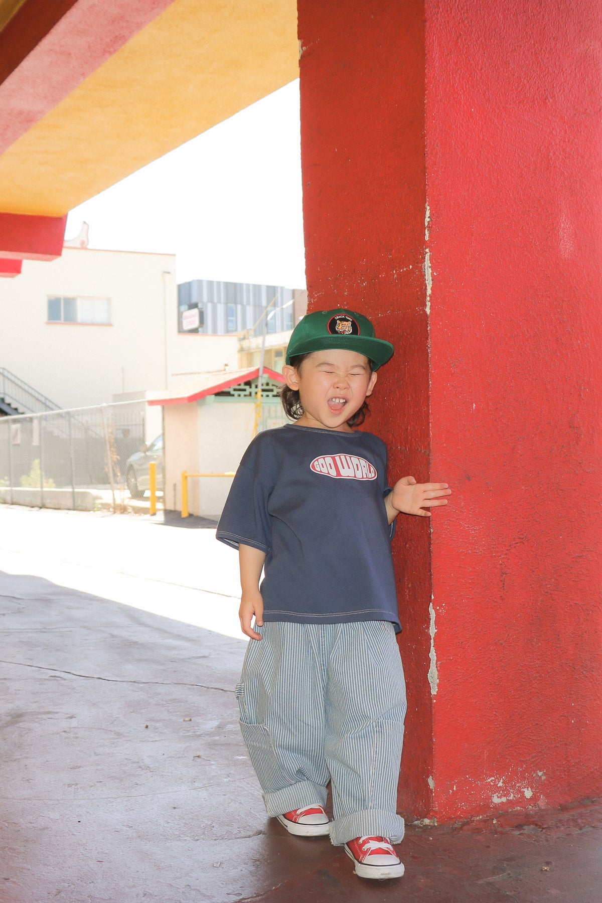 Child wearing blue Worldwide T-shirt by GOO WORLD
